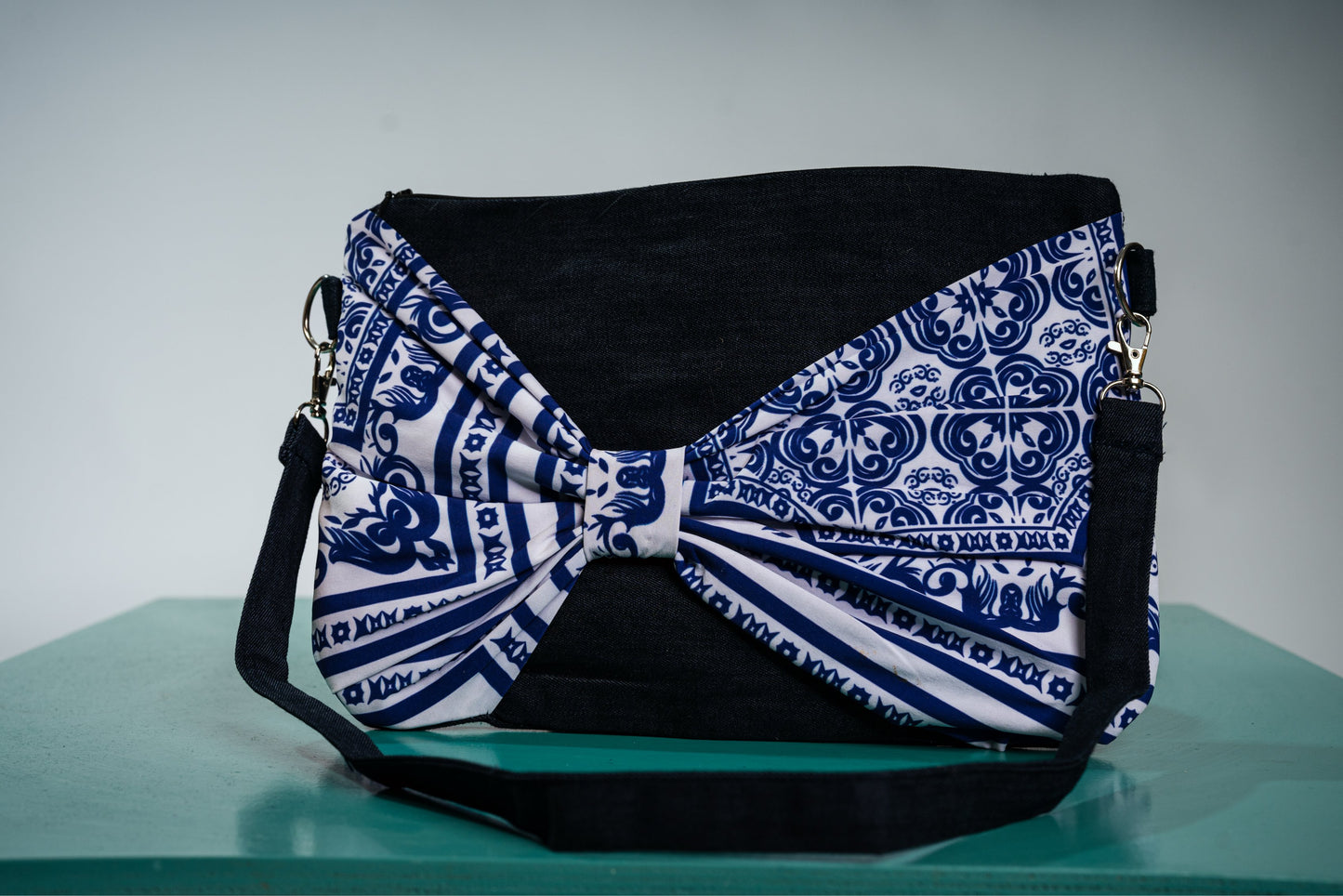 blue wonderland bow clutch