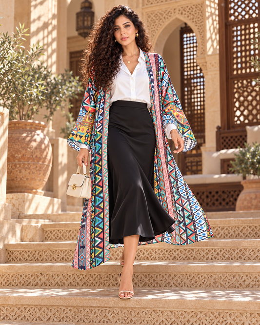Peasant's Dream long cardigan styled with a black skirt and white shirt