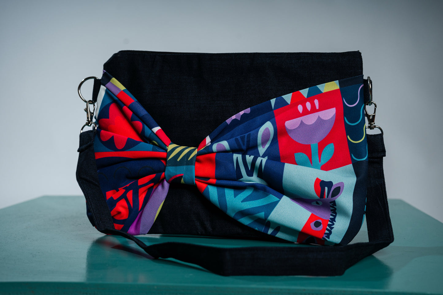 jungle jewels bow clutch