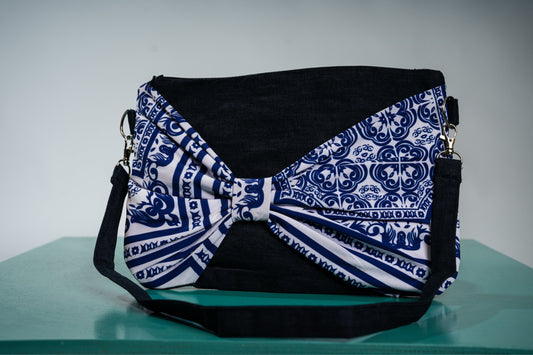 blue wonderland bow clutch